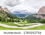Panoramic view of the scenic road (Gardena Pass) through the pass between Val Gardena and Val Badia leading to the alpine town Colfosco