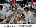 Small photo of Mexico City, Mexico. October 27, 2023. Volunteers receive and sort donations at the Mexican Red Cross collection center. All donations will be sent to Acapulco to help the victims of Hurricane Otis.