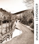 Small photo of Bohr na Brina Valley. Walking people. Sepia Photo.