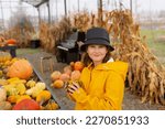 Cute Little Girl Holds Pumpkin...