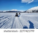 Small photo of Amazing glacier in Alaska. The pure nature turns liquid to beautiful blue solid of ice. Taking a fun ride on Snowmobile to the glacier is once in a lifetime experience.