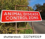 Small photo of A signpost advising of an Avian Flu infection zone, Chelsworth, Suffolk, England, UK November 2022