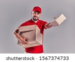 delivery courier giving... | Shutterstock . vector #1567374733