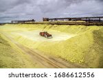sulfur factory. loading of sulfur in railway cars
