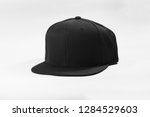 Black snapback cap flat visor isolated on white background. Ready for your mock up design or presentation your design project