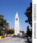 Small photo of Perspective of the bell tower of the Church of St. Pelagius ("Crkva Sv. Pelagija" or "Museum Lapidarium") of Novigrad, Istria, Croatia