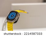 Small photo of Frankfurt, Germany - October 12th 2022: A german photographer bought the new Apple Watch Ultra in an Apple Store, installing an initiating it at home.
