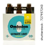Small photo of Winneconne, WI - 4 October 2017: A Six pack of Omission beer on an isolated background.
