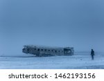 Island Solheimasandur plane wreck US Navy  with photographer in snowstorm