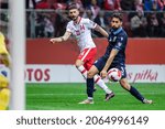 Small photo of WARSAW, POLAND - 9 OCTOBER, 2021: FIFA World Cup Qatar 2022 Qualifiers Match, Poland Vs San Marino 5:0, o.p: Mateusz Klich of Poland and Mirko Palazzi of San Marino