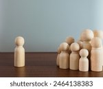 Group of wooden puppets in a...