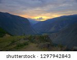 Small photo of Mountain river flowing in the valley, morning snick. Pass "Katu-Yaryk" and the valley of the river Chulishman. Siberia, Altai Mountains.