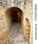 Small photo of CONSUEGRA, SPAIN - NOVEMBER 22, 2018: Route of Don Quixote, interior entrance of the medieval castle of the city of Castilla La Mancha.