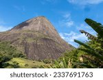Small photo of Stunning view of a huge mountain. Impressive rock wall with peaked top in the sun and blue sky. Dubois Stone, Saint Mary Magdalene