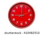 Red Wall Clock Isolated On...