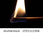Small photo of burning matchstick dead match burning fire with black background light a match