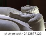 Small photo of Anthropoid Sarcophagi of men. Mixed Egyptian-Greek-style sarcophagus from Sidon. Close up fragment, selected focus. Istanbul, Turkey. October 18, 2022