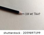 Pencil on copy space craft paper with text written CAN WE TALK?, concept of asking to have an openly communication which is important in relationships or better understandings when working in team