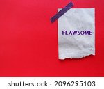 Small photo of Craft paper stick on red copy space background with handwritten text FLAWSOME, refers to individual who embraces their flaws and loving themselves, knowing they are awesome, with all those flaws