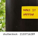Small photo of Yellow stick note on black wall with handwritten text MAKE IT HAPPEN!, idiom of self motivati on to make efforts and achieve your goal, take action, do it and complete it