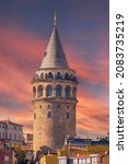 Small photo of Spectacular view of Galata Tower at sunset. Galata Tower (Galata Kulesi) is a medieval stone tower in the Galata quarter of Istanbul, Turkey.