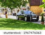 Small photo of Broadway,Worcestershire, England - 4.23.21: An elegant modern Rolls Royce is parked up in the genteel countryside village of Broadway.