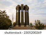 Small photo of Tabriz, Iran - October 30, 2019: Memorial Tower of Anonymous Martyrs in Azeri architectural style for those died in Iran-Iraq war in Eynali Mountain range, Tabriz, East Azerbaijan Province, Iran.