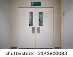 Small photo of Emergency exit door. Emergency Fire exit door with alarm bell in hospital and commercial building.