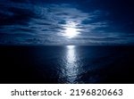 Small photo of Moonlight in ocean landscape. Bright full moon over the sea