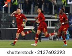 Small photo of Rome, Italy, March 20, 2022. Lorenzo Pellegrini, of AS Roma celebrates with Chris Smalling and Tammy Abraham, after scoring during the Serie A football match against Lazio at the Olympic stadium