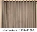 brown curtain at hotel window | Shutterstock . vector #1454411780