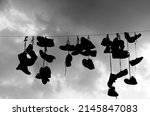 Silhouette Of Tied Shoes...