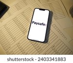 Small photo of Munich, Bavaria, Germany - March 31 2023: Paysafe offers secure online payment solutions globally. They specialize in prepaid cards, online wallets, and mobile payment methods
