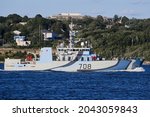Small photo of Halifax, Nova Scotia, Canada. September 7th 2021. HMCS Moncton a coastal defence vessel bedazzle in Second World War paint pattern part of Sail past leaving the Halifax harbour