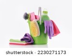 Small photo of Household Cleaner tools and sundry items Spring cleaning kitchen, bathroom and other rooms. on white. Cleaning and janitorial service concept. Green and vibrant violet