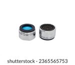 Small photo of Clean new faucet aerator isolated on white background. Water tap dial for more efficient use of water or water flow regulator.