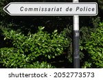 Small photo of Police station road sign and direction in France called commissariat de police in french language in France