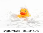 A Toy Duck Covered In Foam...