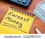 Small photo of Earnest money memo in the yellow notepad.