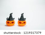 two jack o  lantern wearing... | Shutterstock . vector #1219317379