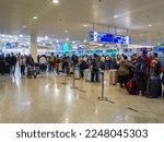 Small photo of Athens, Greece - Thursday 27th October 2022: People queueing at Athens airport at check in their luggage for departure.