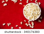 Bowl With Popcorn On Red...