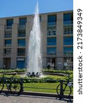 Small photo of berlin, 2022, june, 05, water fountain at Pariser Platz in front of a branch of DZ Bank
