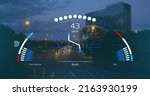 Small photo of Image of speedometer, gps and charge data on interface, over sped up city traffic at night. transport and technology, engineering design and digital interface concept digitally generated image.