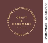 handmade crafts logo badge... | Shutterstock .eps vector #1284387970