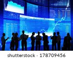 Silhouette of Stock Market Discussion 