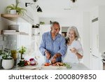 Elderly Couple Cooking In A...