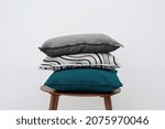 Minimal linen cushion covers on a chair