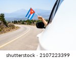 Woman Holding Cuba Flag From...
