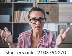 Small photo of Confused doubtful woman feeling baffled looking at camera unaware about problem. Portrait of clueless cauacsian businesswoman unsure about what happened. Female executive uncertain looks